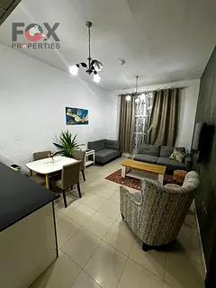 One bedroom and living room for annual rent with furnishings in City Towers, Al Nuaimiya 3, directly