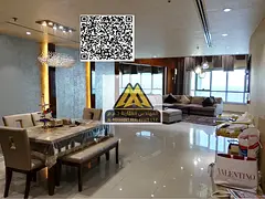 A luxurious furnished apartment for annual rent in Ajman Corniche Towers, offering a massive 3400 sq