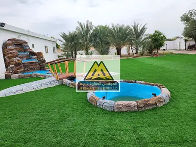 قصر فاخر للبيع في المنامة عجمان 6 غرف بتشطيبات راقية مسبح خاص وحدائق واسعة وشلال مميز مساحة أرض 43000 قدم فرصة استثمارية مميزة