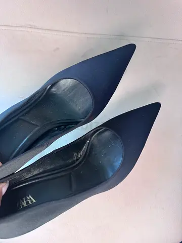 Black pointed-toe womens pumps, used once!