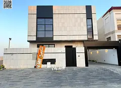 Luxury villa for sale in Al Bahia area, featuring two floors and a rooftop terrace. Modern design, s