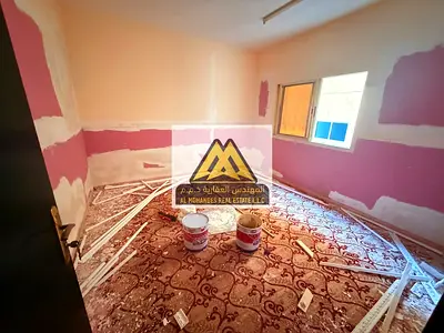One-Bedroom Apartment for Annual Rent in Al Nuaimiya 1 Ajman – Central AC and Balcony