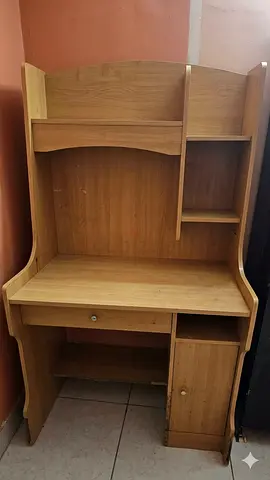 Compact wooden study desk with shelves and cabinet