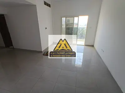 Two-Bedroom Master Apartment with Living Room for Annual Rent in Al Rumaila 1 - Near the Corniche