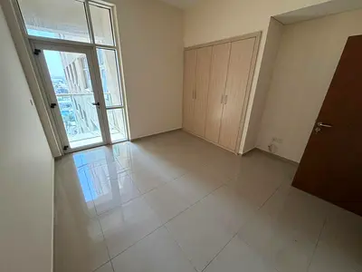 Two-bedroom apartment with a living room - Al Nuaimiya 1, Ajman - Central air conditioning - Family accommodation - Free maintenance - 3 bathrooms