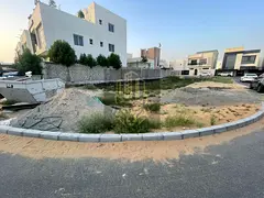 Corner plots for sale in Al Zahya, prime entrance location, 280 sqm, two roads, G+2 permit, surround