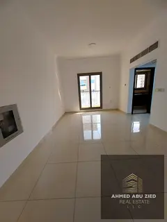 Annual rent Ajman - 1BR opposite Garden City - 2 bathrooms - balcony - central AC - prime location -