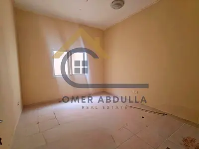 LAVISH 1BHK CLOSE HALL ON ROAD BUILDING IN MUWAILEH