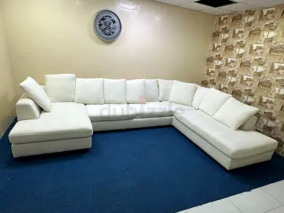 Like new condition the one brand white color Ushape sofa