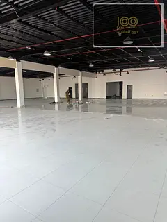 Showroom 13,000 sq ft UAQ King Faisal St, 40kW, main road, parking, AED 600K yearly.