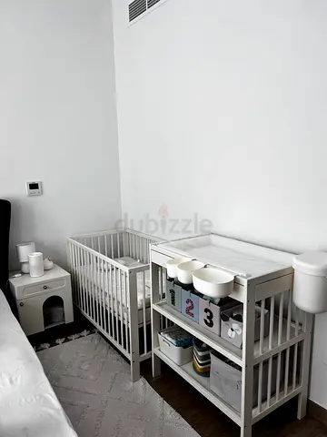 White Wooden Baby Changing Table with Storage and Bassinet-style Crib (Set)