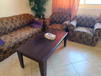 5 seater sofa and tea table for sale in RAK
