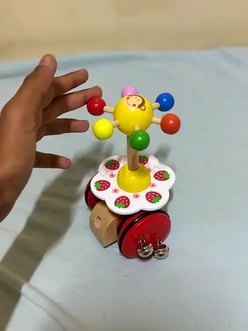 Wooden Pull-Along Musical Toy with Colorful Spinning Top