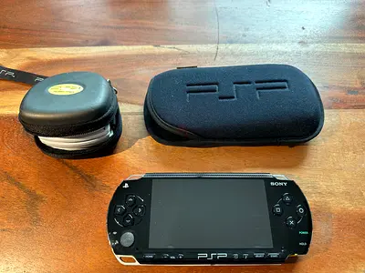 Sony PSP 2000 Handheld Console with Carry Cases - Good Working Condition