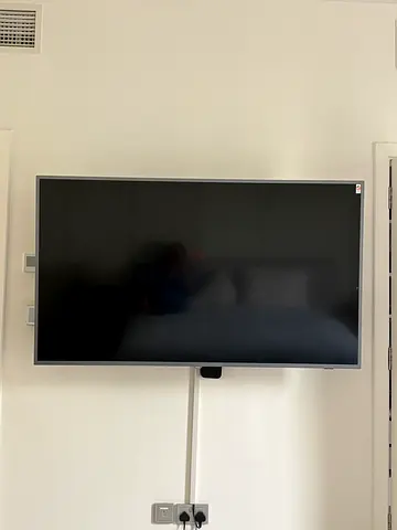 50-55 inch Wall-Mounted LED TV - Good Working Condition
