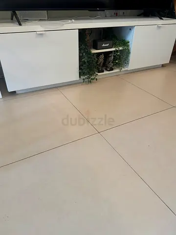 White low TV entertainment unit with cabinets