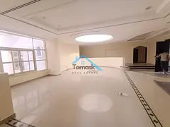 Super deluxe villa for rent in Al Warqa 4, consisting of 5 master bedrooms, a large living room, a l