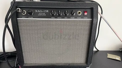 Electric guitar Amp 15w with reverb Best for practice with multi effects pedal.