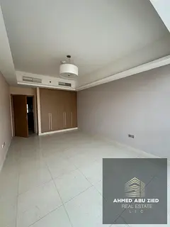 Two bedrooms and a living room for annual rent in Gulf Towers, Rashidiya 1. Free parking, gym and sw