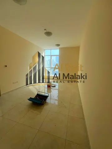 One bedrooms and a living room in Al Taawun without a balcony and open view