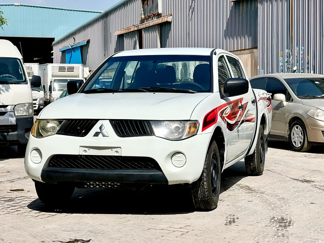 Mitsubishi L200 2007 — photo 1 of 7