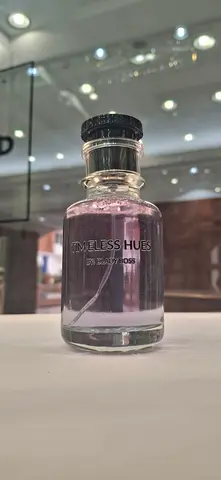 Small bottle of Tres Homme / Tres Hu perfume (partially used)