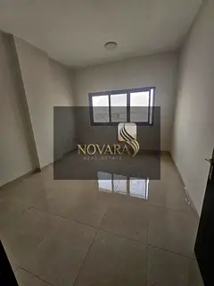 Two-bedroom apartment with a living room available for annual rent in Ajman – Al Jurf 3 area. A di