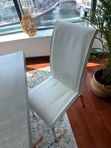 Modern rectangular dining table with 6 white chairs