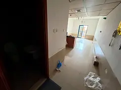 Studio apartment in Tower C with an American-style kitchen, spacious area with balcony, private park