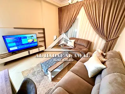 Monthly rent for the first new resident in Sharjah, Al Taawun area, two bedrooms and a hall with free internet