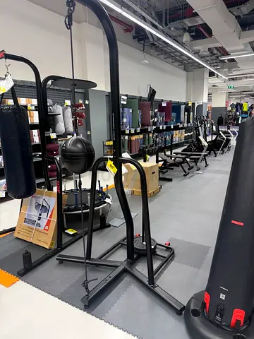 Boxing heavy punchbag and frame with weights