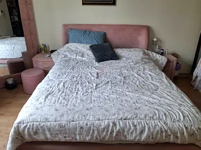 Queen-sized upholstered bed with matching nightstands (pink velvet) - good condition