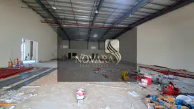 Warehouse with showroom for annual rent in Umm Al Quwain, 11,000 sq ft, 100 kW electricity, AED 55 p