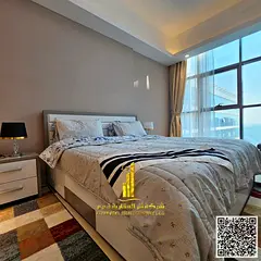 Beautiful furnished one-bedroom apartment with new furniture for monthly rent in Ajman - Al Rashidiy