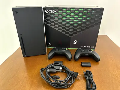 Xbox Series X 1TB with two controllers and original box — Excellent condition