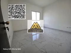 A spacious 2-bedroom apartment for annual rent in Al Rashidiya – Mina Street, Ajman, featuring a l