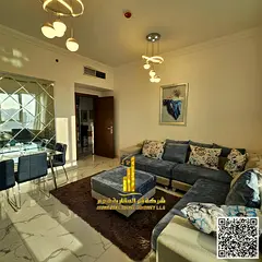 One-bedroom apartment with a gym, swimming pool, and parking, furnished view, for monthly rent in Aj