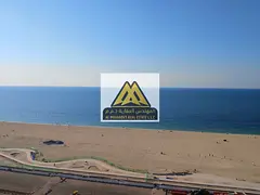 A luxurious apartment for annual rent in Corniche Towers, featuring a very spacious layout and a ful