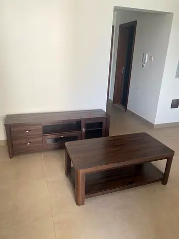 Used dark wood TV console and matching coffee table - good condition( come take for free)