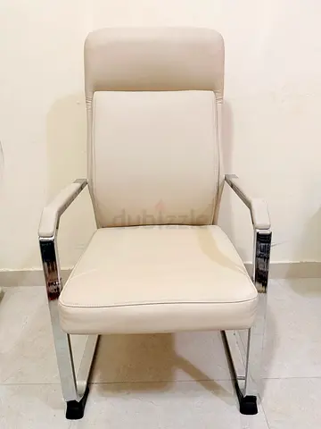 Beige Leather Chair with Chrome Frame