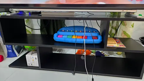 Small and compact TV stand suitable to place upto 55 inch tv and some housold stuffs in the shelf