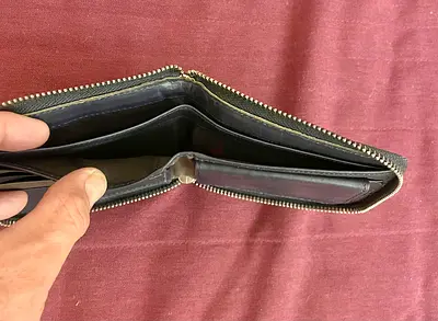 Black zip-around leather wallet unused