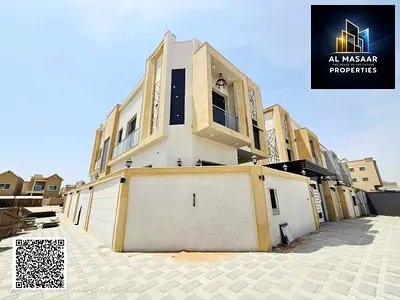 Luxury corner villa for sale in Al Muwaihat 2 with a large setback, modern design and custom finishing, prime location close to amenities.