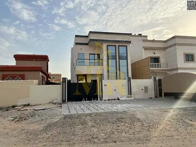 Villa for sale next to Ajman Academy, Al Muwaihat 2. Luxury, prime location, and ideal spaces for family living. Freehold ownership for all nationalit