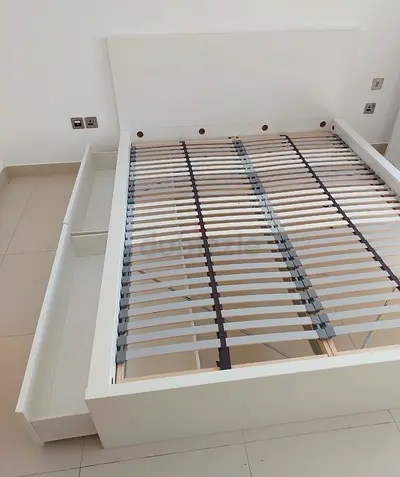 Ikea Queen size bed with mattress underneath 2 storage drawers available in perfect condition