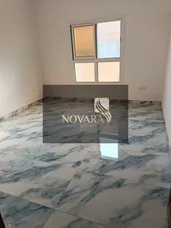 Office for annual rent in Al Jurf Industrial Area 1 – One room and hall, first occupancy, ready to