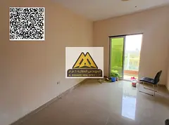 A 2-bedroom apartment for annual rent in Al Nuaimiya 2 – Ajman. It features a spacious layout, a c