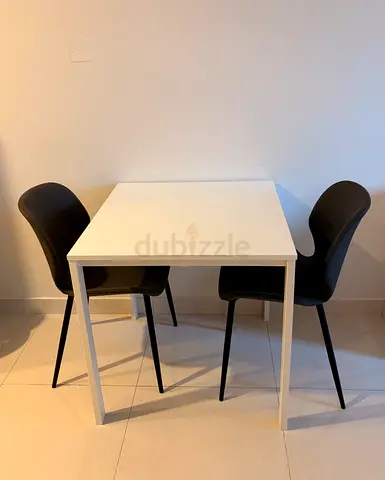 Compact white dining table