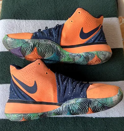 Nike Kyrie-style mid-top basketball shoes, size unknown, used
