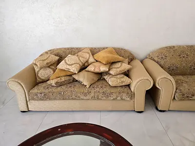 Three seater plus 2 xTwo-seater fabric sofa in beige with floral cushions